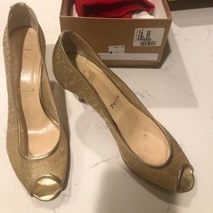 Christian Louboutin kitty heel gold shoes